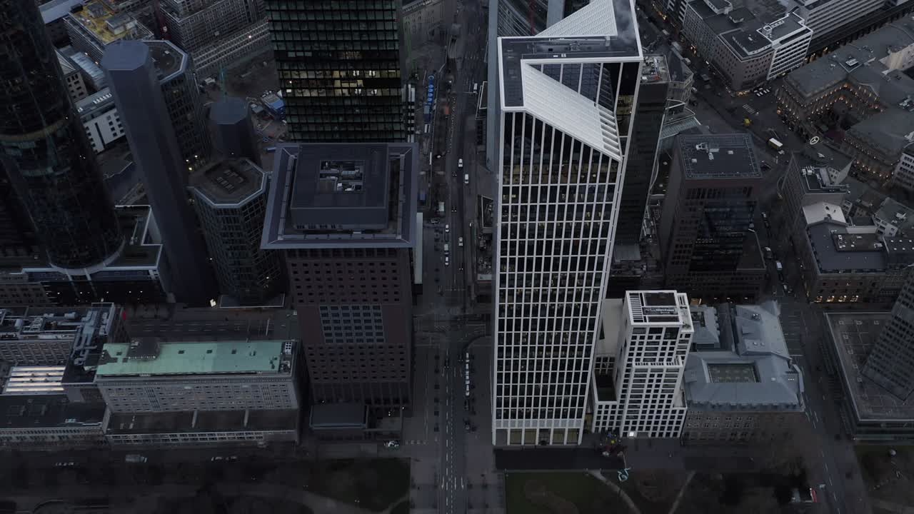 High angle view of downtown streets. Road traffic among modern skyscrapers. Frankfurt am Main, Germany
