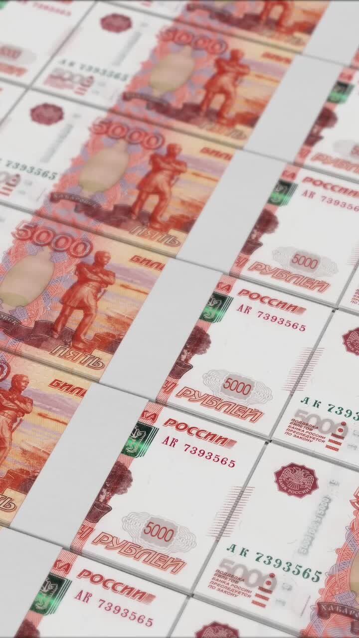 Vertical video of 5000 RUSSIAN RUBLE banknotes printing by a money press