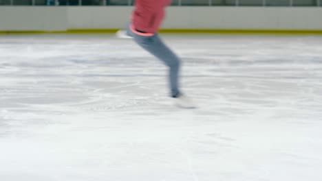 caucasian woman jumping toe loop