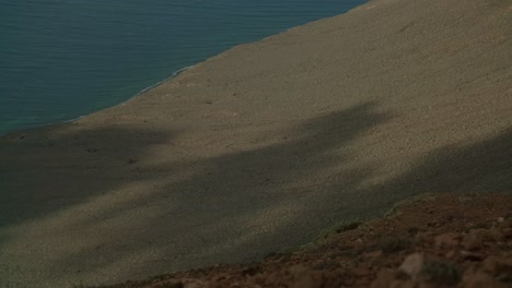 lanzarote's unique landscape: mountains, red rocks, and ocean views