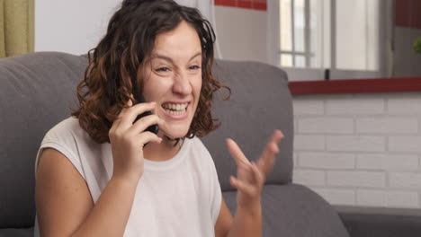 woman arguing on the phone from her home