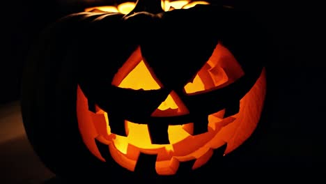 close-up of a lit jack-o-lantern