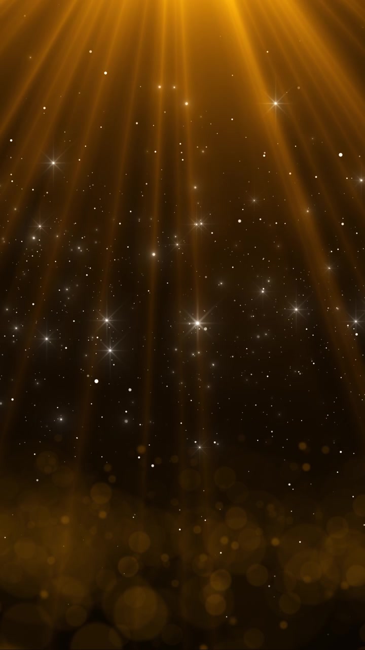 Amber stage light background overhead beams glitter dust and glowing star particles for event