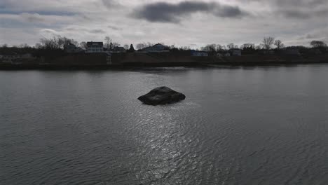 An-aerial-view-of-the-calm-waters-of-the-Long-Island-Sound-off-Long-Island,-NY-on-a-cloudy-day