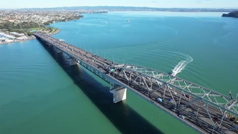 auckland harbour bridge from north shore with view towards auckland city in new zealand