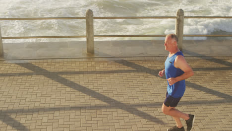 senior man running on the promenade