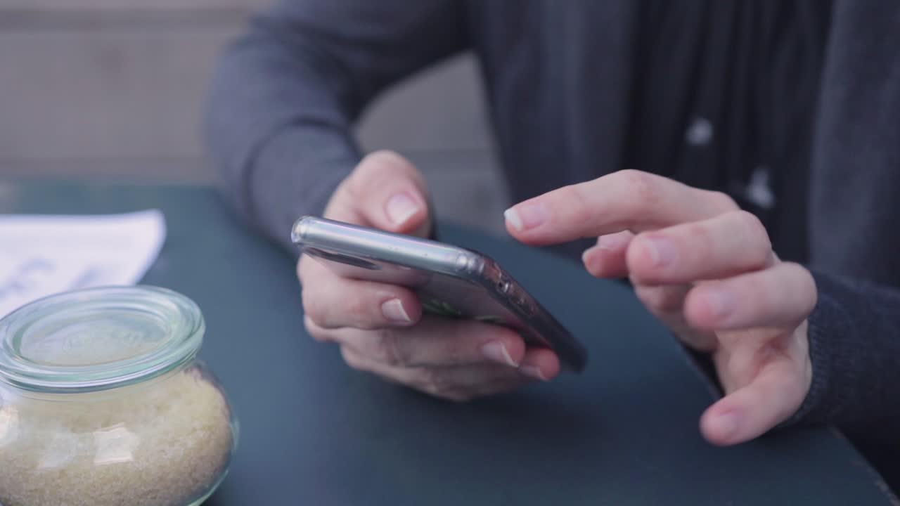 Close-up of ladies hands using a mobile phone