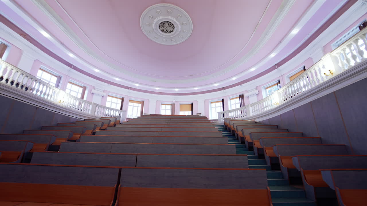 Big empty lecture room for study. Pandemic university classroom.