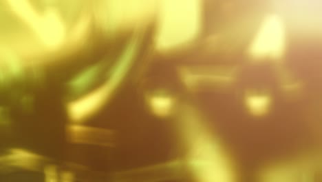 abstract golden bokeh with gold background. seamless loop