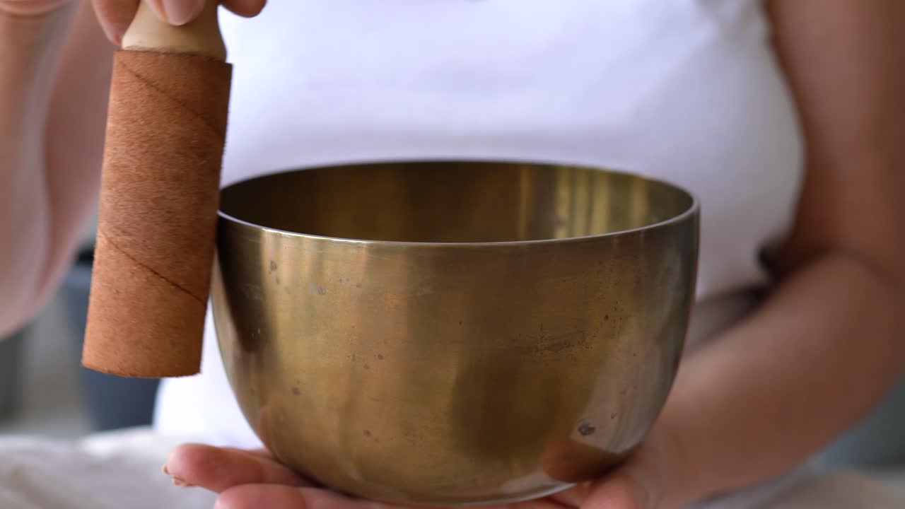 Large Tibetan Mallet (Wand) And Singing Bowl For Sound Therapy. Close-up Shot