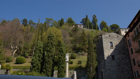 statue at the torre delle arti in bellagio, como province, italy