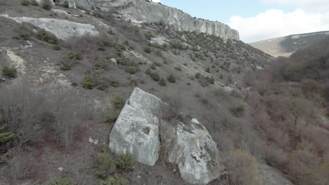 mountainous landscape with cliffs and valley