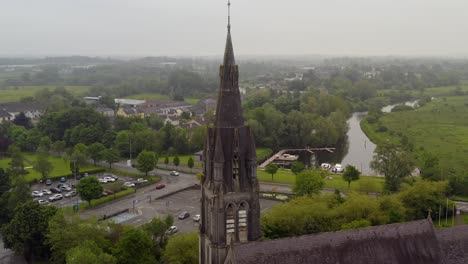 saint michael's church in ballinasloe galway pulling away to reveal broader landscape and river