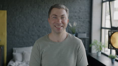 smiling man in a studio