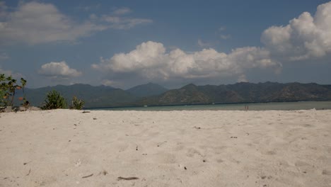 timelapse shot of sandy beach of tropical gili air island during sunlight