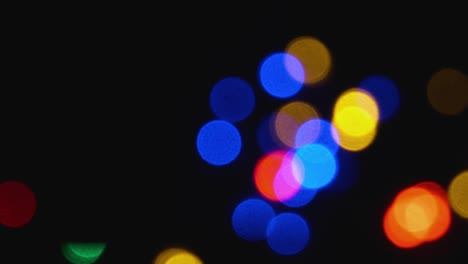 abstract festive background of blurry garland lights.