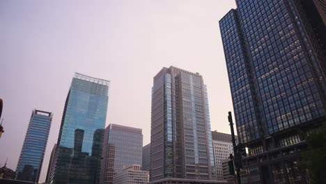 tokyo city establishing shot at tokyo station marunouchi square, early evening