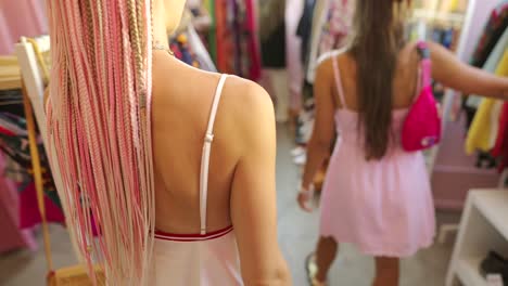 women shopping for clothing at a vintage shop