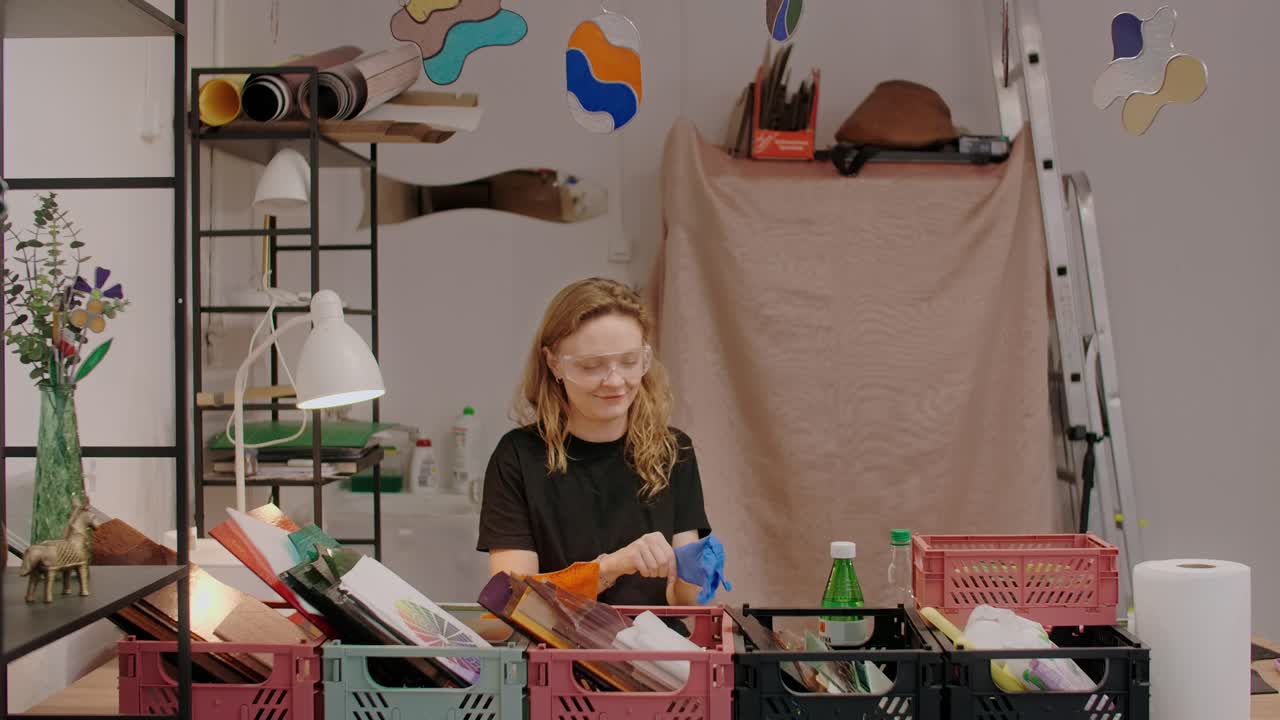 A woman crafting in her studio