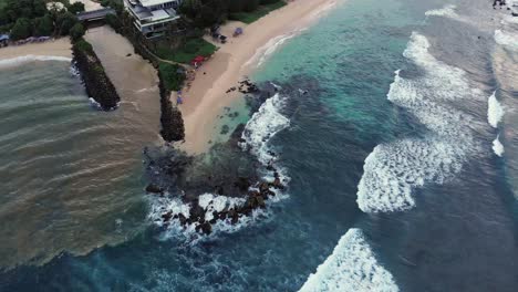 Drone-View-of-Tropical-Beach-by-Beachfront-Homes-in-Sri-Lanka