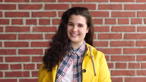 portrait of a funky woman smiling while isolated