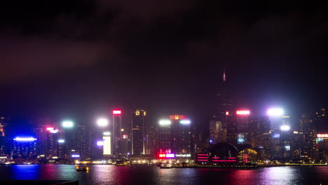 hong kong - 19 march 2025 : hong kong central city skyline filmed from across the harbour in kowloon with all the skyscrapers lit up at night advertisements