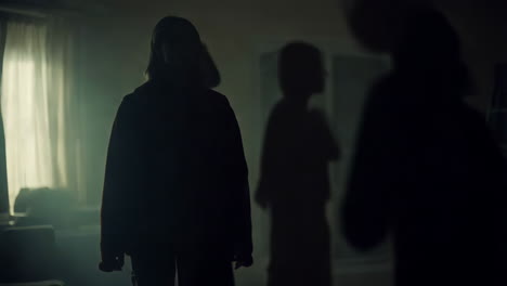silhouette of woman in a room