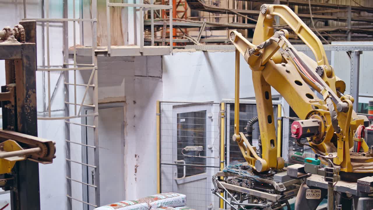Processing of timber at the sawmill. Sawing boards from logs with modern sawmill
