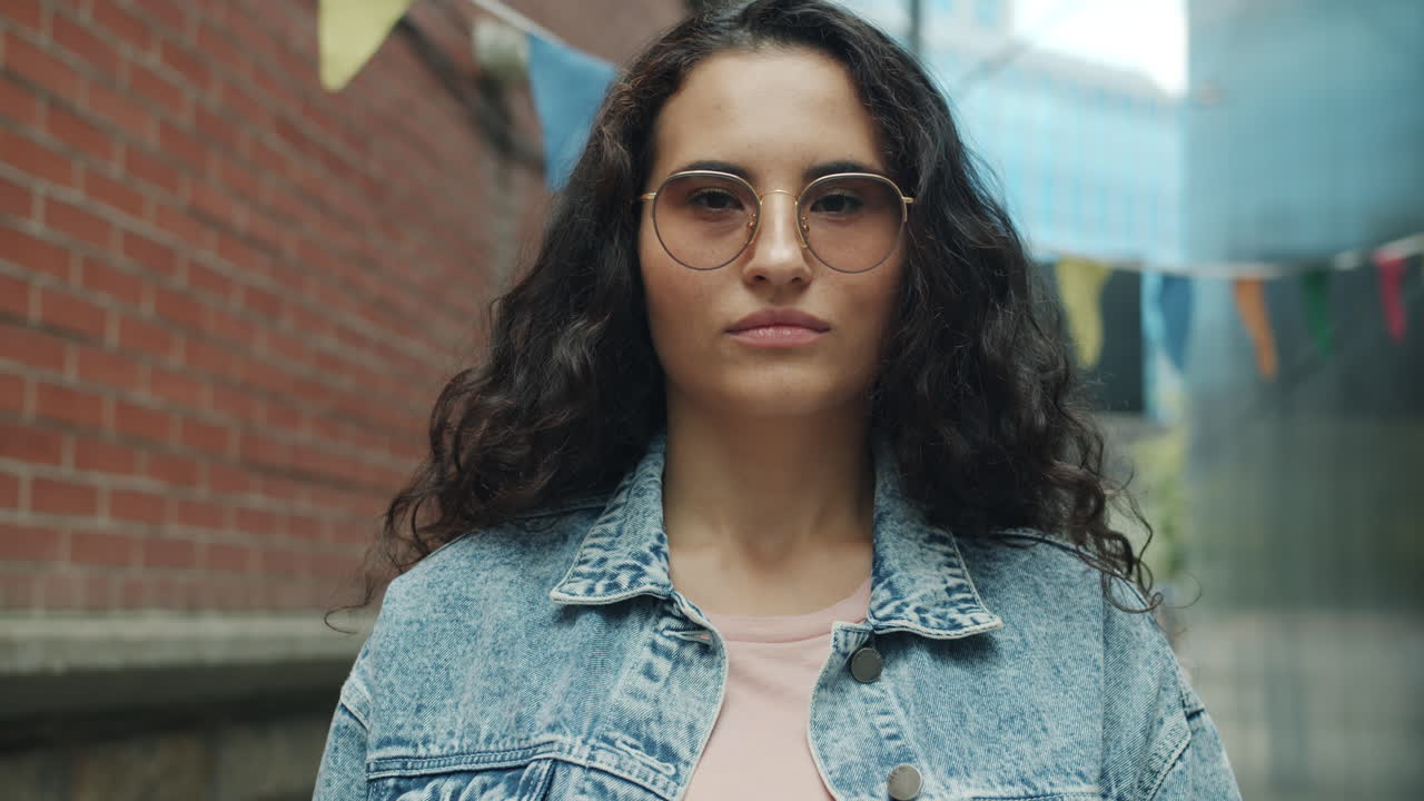 Young Woman in City Alley
