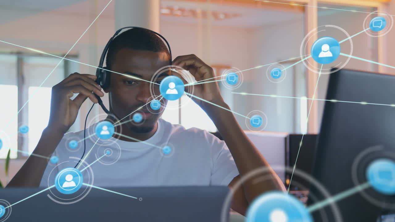 Animation of networks of connections and businessman wearing phone headset
