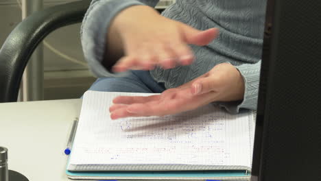 Person Studying and Discussing