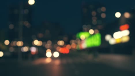 borrón de las luces de la ciudad. movimiento disparado desde el coche