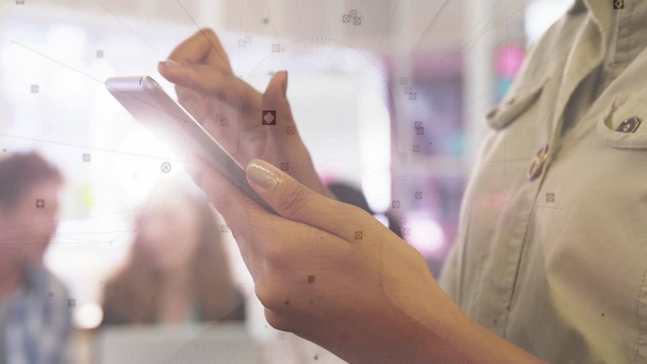 Team member entering office meeting, tapping smartphone and swiping to display floating data nodes