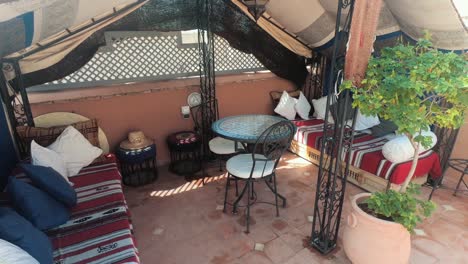 nice riad rooftop with colorful pillows and mosaic