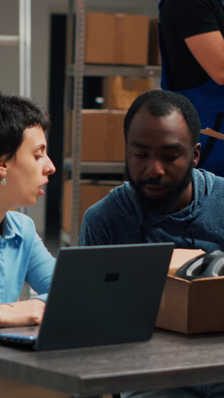 Vertical video: Business partners planning order shipment and logistics