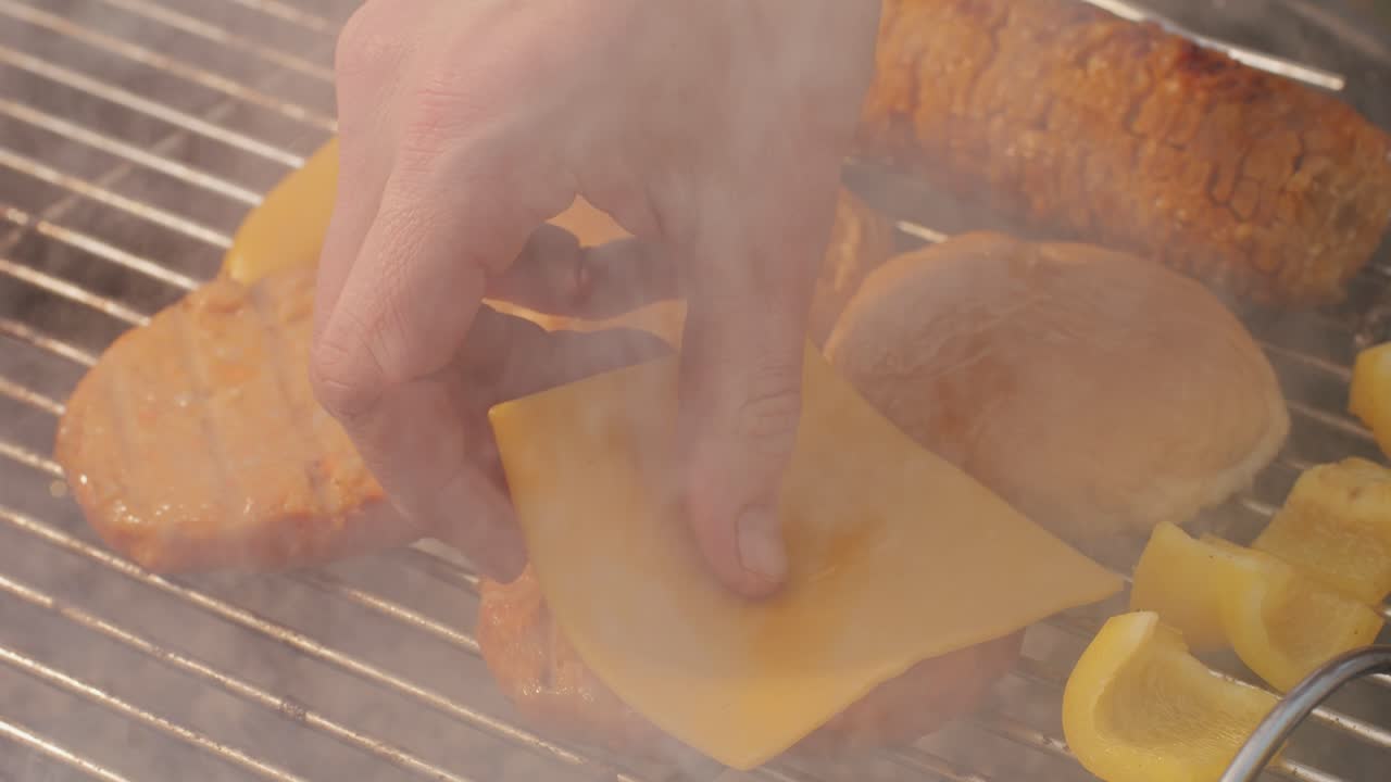 Veggie orange burger on grill, carrot and oats burger with corn and yellow pepper, vegetarian food barbeque, potato grill burger.