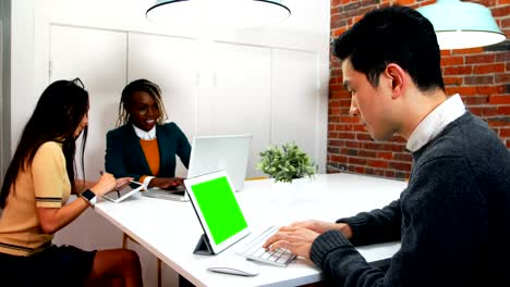 business executives working at desk
