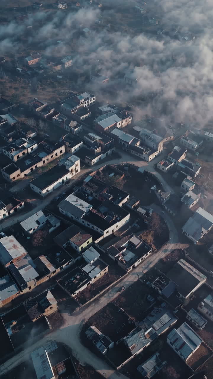 Aerial View of a Foggy Village