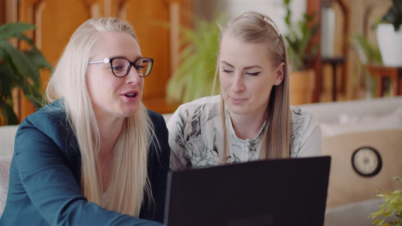 Female Colleagues Discussing Business Strategy In Office 5