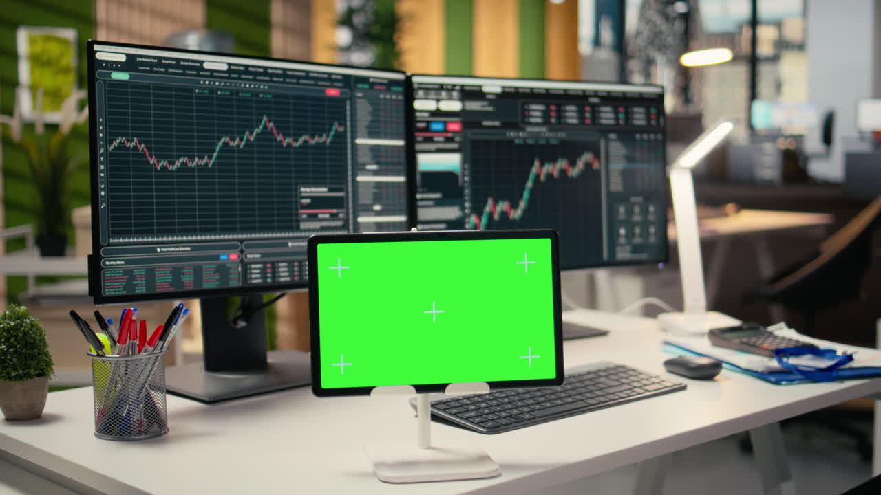 Trading software in prop firm office with graphs on isolated screen tablet