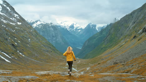 woman hiking in norwegian mountains