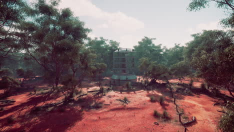 torre abandonada en un bosque de tierra roja