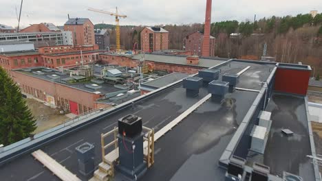 aerial view of a construction site with cranes and machinery