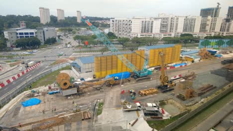 timelapse of construction site in singapore building an underground freeway highway tunnel