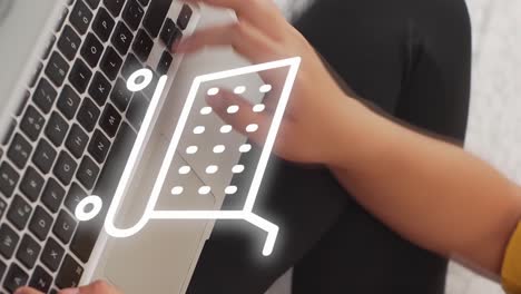 Vertical-motion-graphics-of-shopping-cart-over-young-hands-on-keyboard