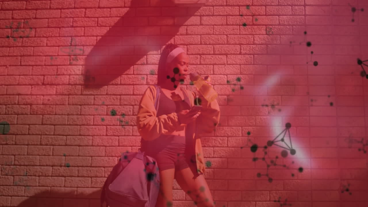 Woman drinking water and checking phone outdoors, presenting health concept with molecular graphics