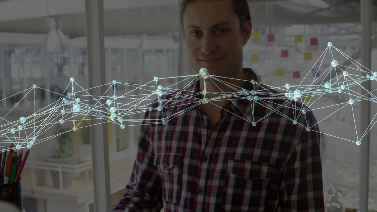 Dev typing on laptop activating network overlay over chest, shifting while presenting tech insights