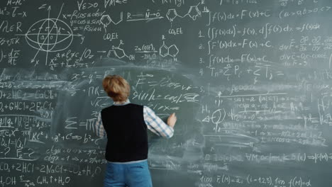 student or teacher working on a math problem