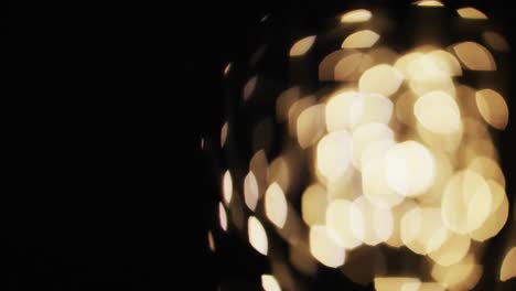 Video-of-flickering-yellow-bokeh-spots-of-light-with-copy-space