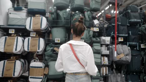 woman shopping for outdoor gear